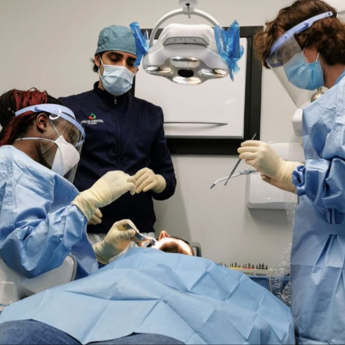 Dental Implant Expert Dr Alfonso Rao supervising delegates to dental implant course